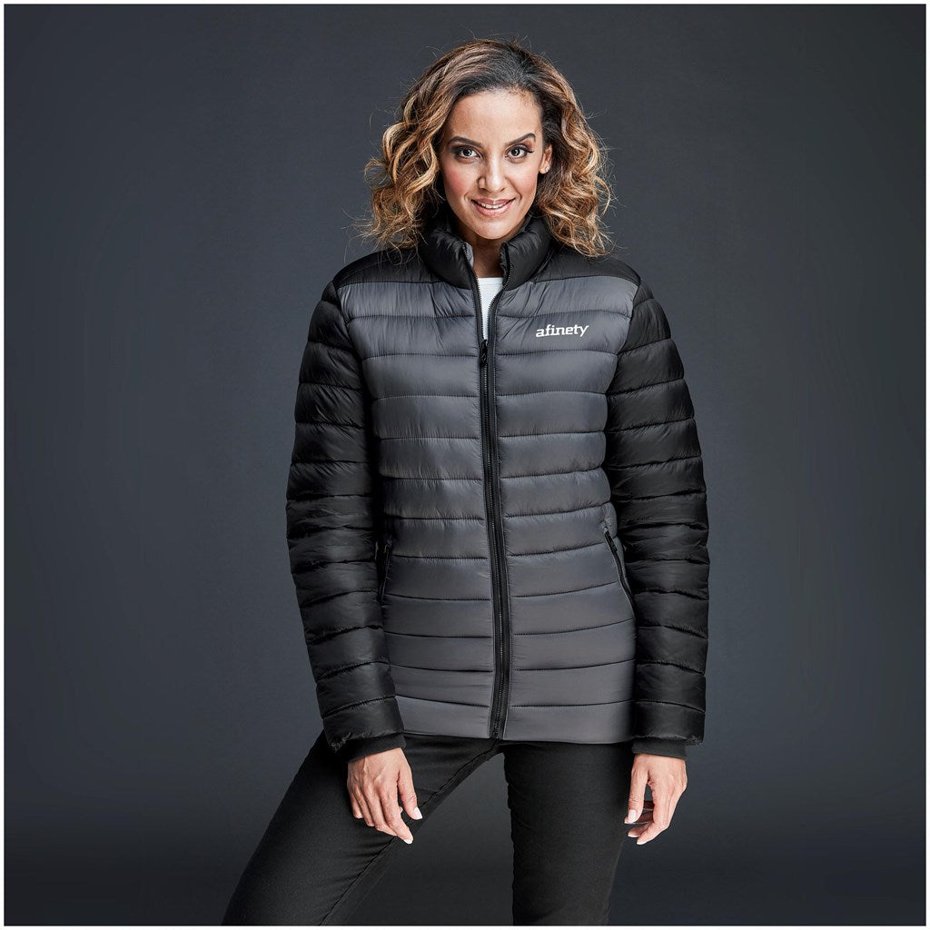 Woman wearing a black puffer jacket 